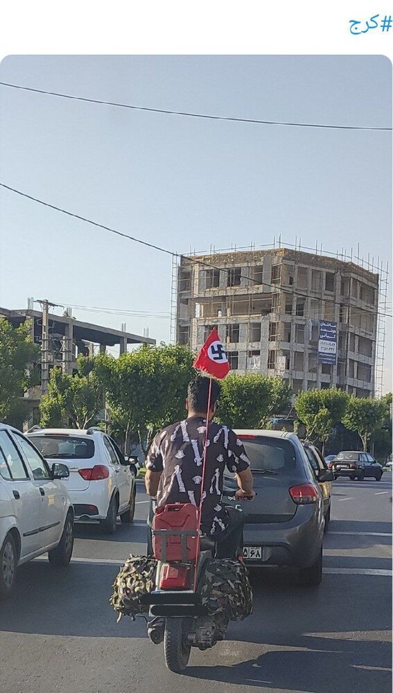 حضور عجیب یک موتورسوار با پرچم نازی در کرج!